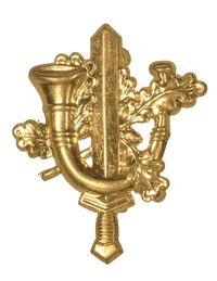 FOREIGN BRASS WREATH WITH CROWN, SHIELD, SWORD & SNAKE IN CENTER
